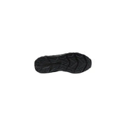 Semelle en caoutchouc noir avec motif géométrique sur les baskets de sport pour homme ea7 noires et beiges, conçues pour la performance.