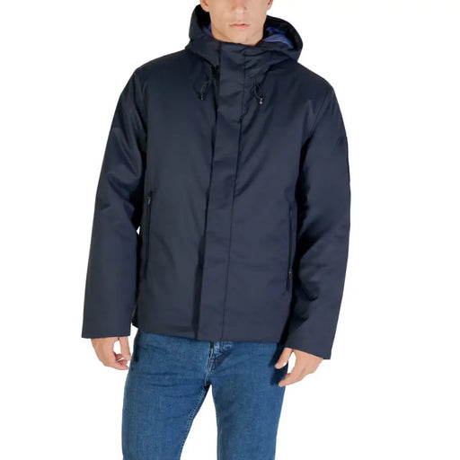 Navy blue waterproof jacket with hood and zipper details.