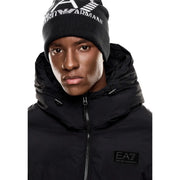 Ea7 Bonnet noir en maille pour homme avec logo ea7 blanc et emblème d'aigle (vue de face)