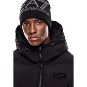 Bonnet Emporio Armani EA7 en maille noire pour homme, avec logo et inscription argentés, vue de face