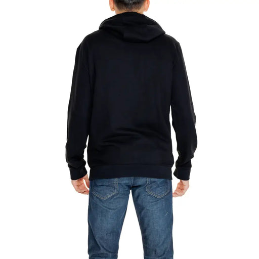 Black EA7 cotton hooded sweatshirt with front pockets paired with blue jeans