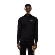 Ea7 Sweat à capuche noir en coton pour homme avec logo et inscription dorés visibles sur la poitrine, la manche et le devant du pantalon