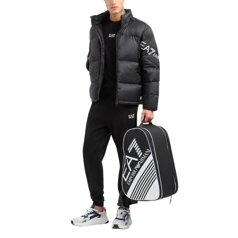 Black and white ea7 emporio armani tennis bag with bold diagonal stripes and logo branding alongside ea7 men black cotton sweatshirt round neck