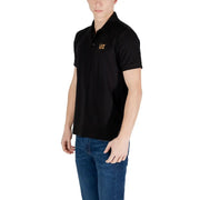 Ea7 Polo noir pour homme en coton avec logo doré sur la poitrine, idéal pour un style décontracté et sportif.