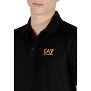 Ea7 Polo noir pour homme en coton, orné d'un logo Emporio Armani brodé en or sur la poitrine.