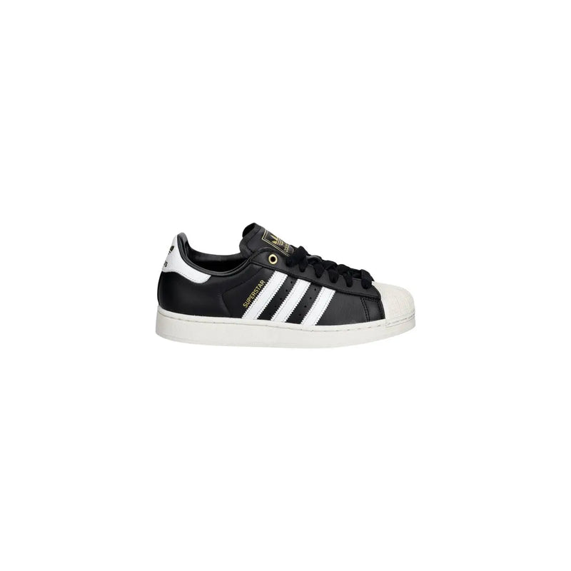 Baskets adidas Superstar en cuir noir avec bout renforcé en caoutchouc blanc et trois bandes pour un style décontracté