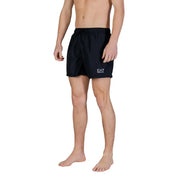Short de bain noir ea7 pour homme, en polyester, avec poches et logo blanc sur la jambe gauche.