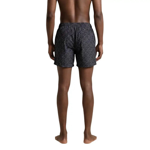 Ea7 Short de bain homme noir en polyester avec poches, orné d'un motif géométrique discret.