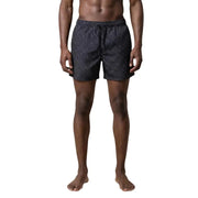 Dark gray ea7 men swimwear trunks with subtle geometric pattern designed for stylish swim use