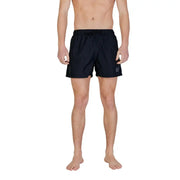 Black Ea7 men swimwear swim trunks with drawstring waistband and subtle logo on lower left leg for beach use