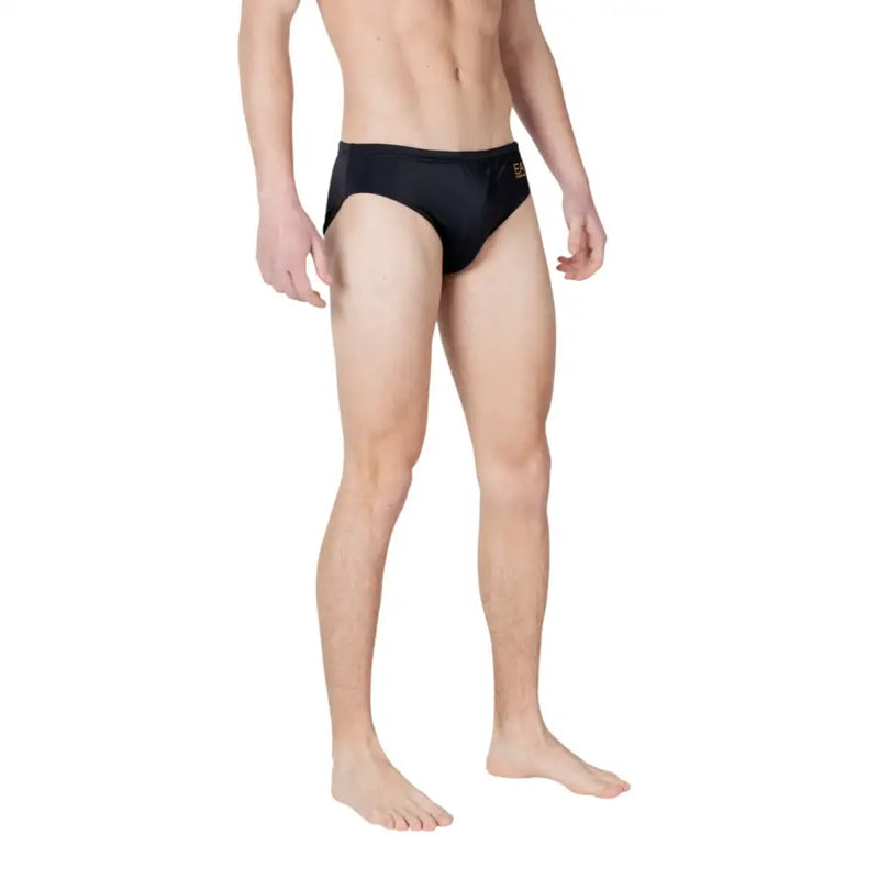 Ea7 men swimwear black swim trunks with small gold logo on the side designed for swimming and beachwear