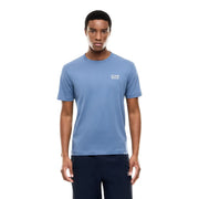 T-shirt homme ea7 bleu clair en coton, manches courtes, avec un logo blanc discret sur la poitrine.