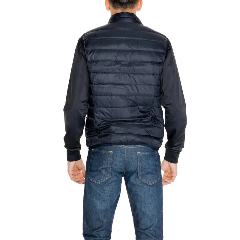 Doudoune EA7 noire matelassée sans manches pour homme, au design moderne, vue de face