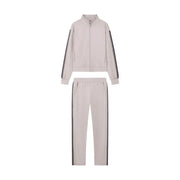 Ea7 Ensemble de survêtement deux pièces pour femme, en mélange de coton beige avec rayures argentées métallisées, idéal pour l'automne et l'hiver.