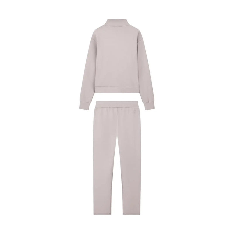 Ea7 Ensemble deux pièces de détente pour femme en mélange de coton beige, composé d'un sweat-shirt à col montant et d'un pantalon fuselé, idéal pour l'automne et l'hiver.