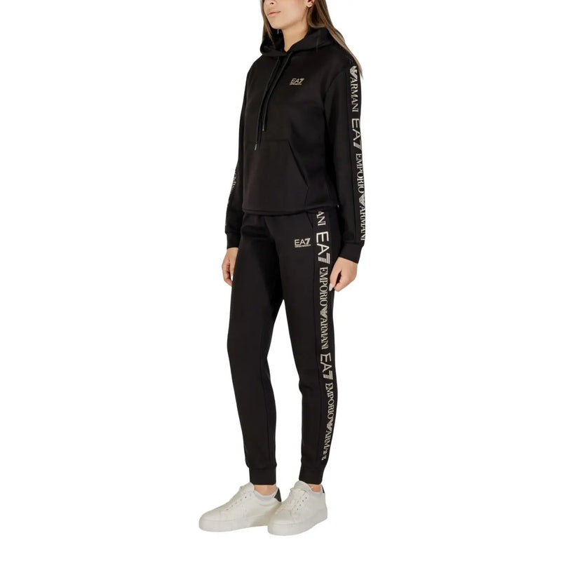 Combinaison pantalon noire à capuche pour femme ea7 Emporio Armani, en mélange de polyester, avec logo blanc sur les manches et les jambes.