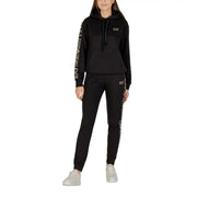 Ea7 Combinaison pantalon noire à capuche pour femme, en mélange de polyester, avec logo blanc sur les manches et les coutures latérales.