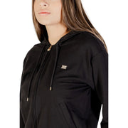 Ea7 Combinaison noire en coton pour femme, à capuche zippée avec cordons de serrage dorés et écusson logo métallique sur la poitrine