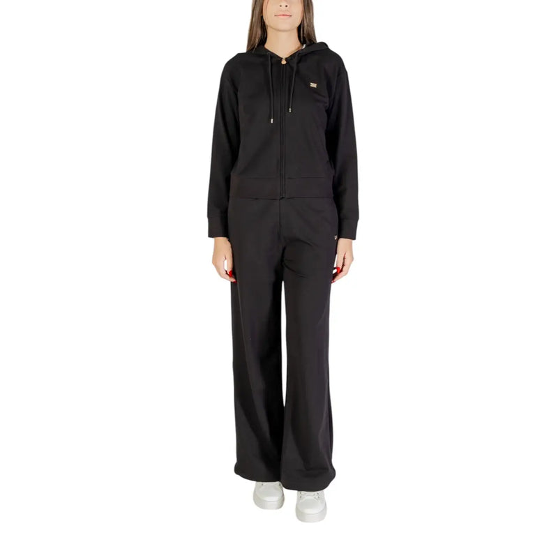 Ea7 Combinaison noire en coton pour femme, à capuche zippée, avec logo doré et pantalon large assorti.