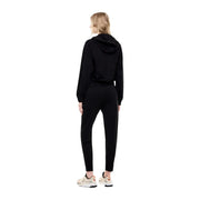 Ensemble sweat-shirt à capuche noir en coton pour femme EA7 et pantalon de jogging assorti, idéal pour l'automne.