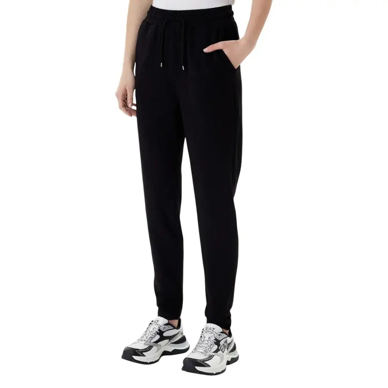 Ea7 women’s black hooded jumpsuit featuring drawstring joggers with a relaxed fit and tapered legs with pockets