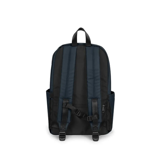 Sac à dos Eastpak pour homme en polyester bleu marine et noir, avec bretelles réglables et poches latérales.