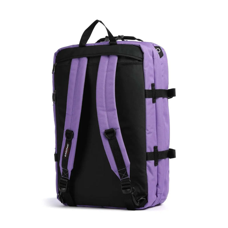 Sac à dos Eastpak pour homme en polyester violet avec poches, bretelles réglables et sangles de compression latérales.