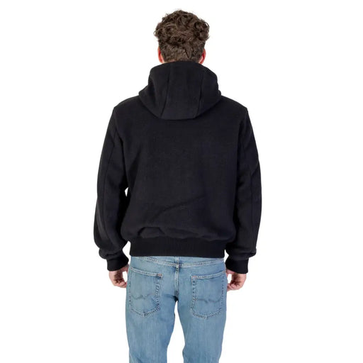 Black hooded sweatshirt paired with blue jeans, displayed with an Elegant Single Breasted Wool Blend Blazer