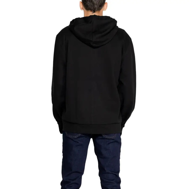 Men’s black full zip hooded sweatshirt with dark blue jeans from Emporio Armani