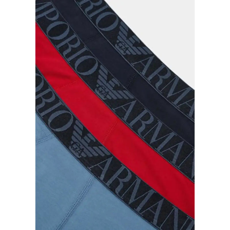 Emporio armani men’s blue print underwear with black and red striped waistband and gray repeating logo lettering