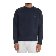 Pull Fay bleu marine foncé pour homme, en maille de coton à col rond, avec un petit écusson rectangulaire brodé sur la poitrine gauche.