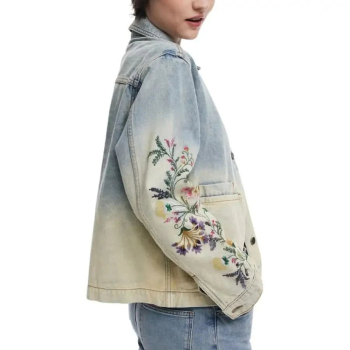 Floral-embroidered denim jacket from Desigual Women’s collection in blue color