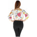 Floral off-the-shoulder crop top paired with black pants for stylish summer attire
