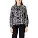 Women’s black and white floral print long-sleeved blouse displayed in the product image