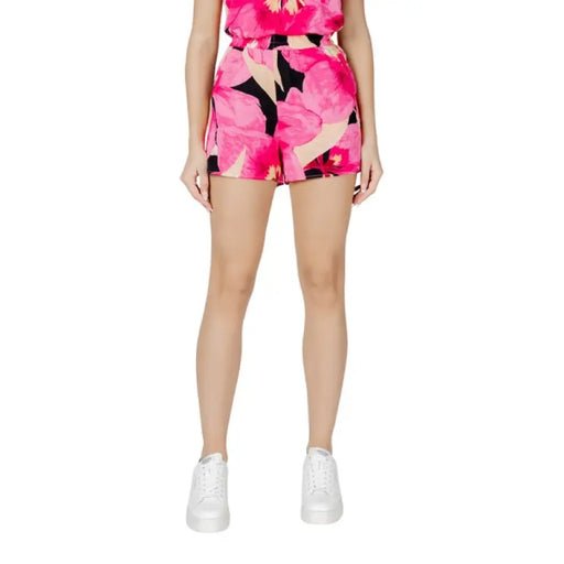 Green leaf patterned floral print shorts for women displayed in a product image