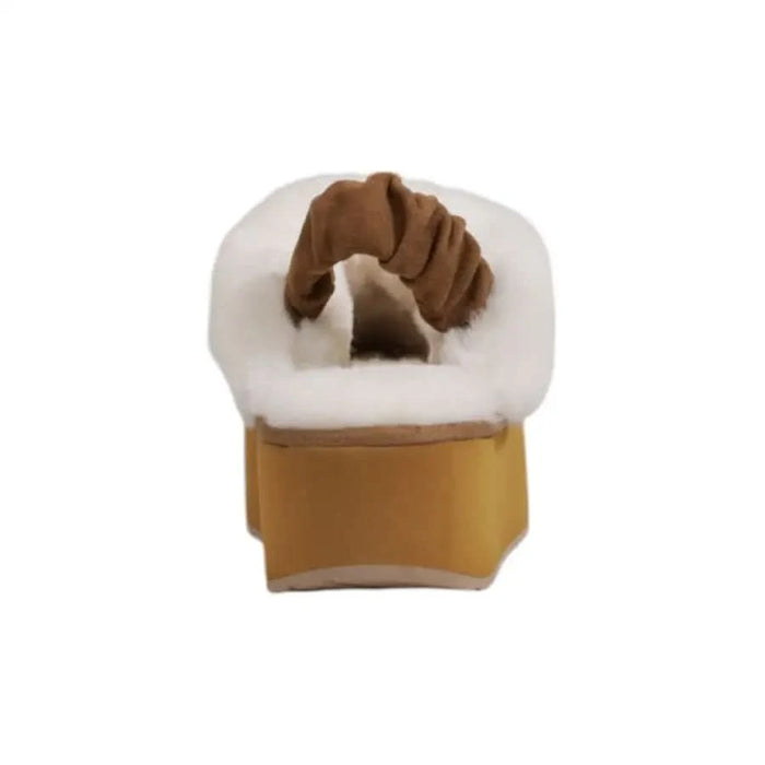 Fuzzy brown and white platform sandal from Emu Australia Women’s Beige Leather Flats