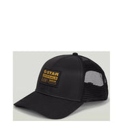 Casquette trucker G-Star Originals en denim brut noir avec dos en maille et logo doré en relief, accessoire pour homme