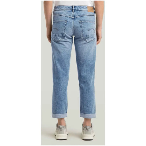 Jean G Star pour femme en denim bleu clair, coupe droite classique, ourlets roulés, en coton stretch.