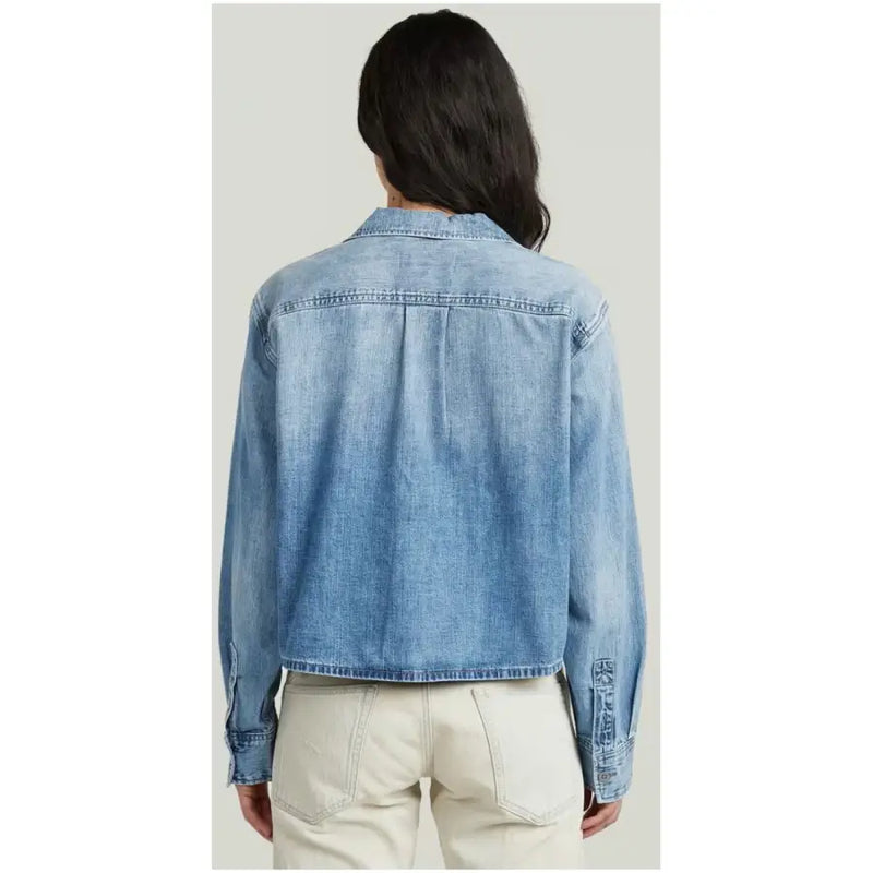 Blazer G-Star pour femme en coton bleu clair, avec col classique et poignets boutonnés.