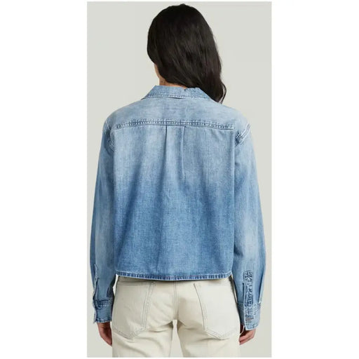 Blazer G-Star pour femme en coton bleu clair, avec col classique et poignets boutonnés.