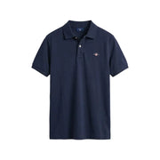 Polo homme Gant bleu marine à col boutonné, manches courtes, en piqué de coton et petit logo brodé sur la poitrine gauche.
