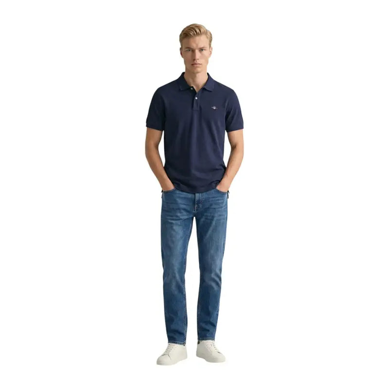 Polo homme Gant bleu marine à manches courtes en piqué de coton, avec petit logo brodé sur la poitrine gauche