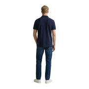Polo en piqué de coton bleu marine à manches courtes pour homme de la marque Gant, idéal pour les tenues décontractées et semi-formelles.