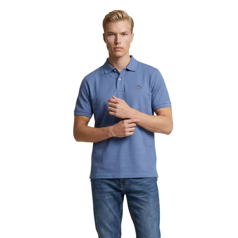 Polo homme Gant bleu à manches courtes en piqué de coton avec petit logo brodé sur la poitrine gauche