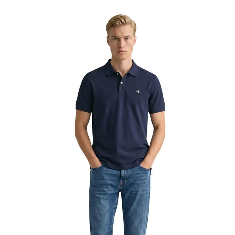 Polo homme Gant bleu marine avec logo brodé discret, en piqué de coton à manches courtes