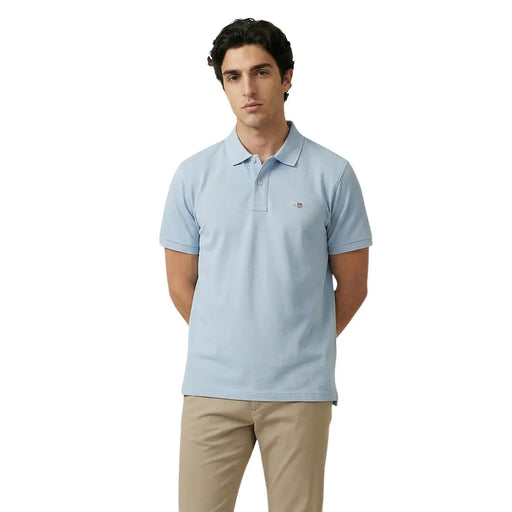 Light blue pique cotton stretch polo shirt for men by gant with small embroidered logo on the left chest