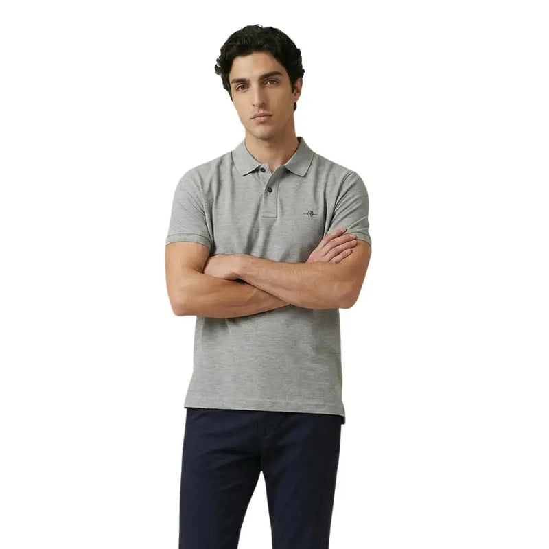 Polo homme Gant en coton stretch texturé gris, manches courtes, petit logo brodé sur la poitrine gauche