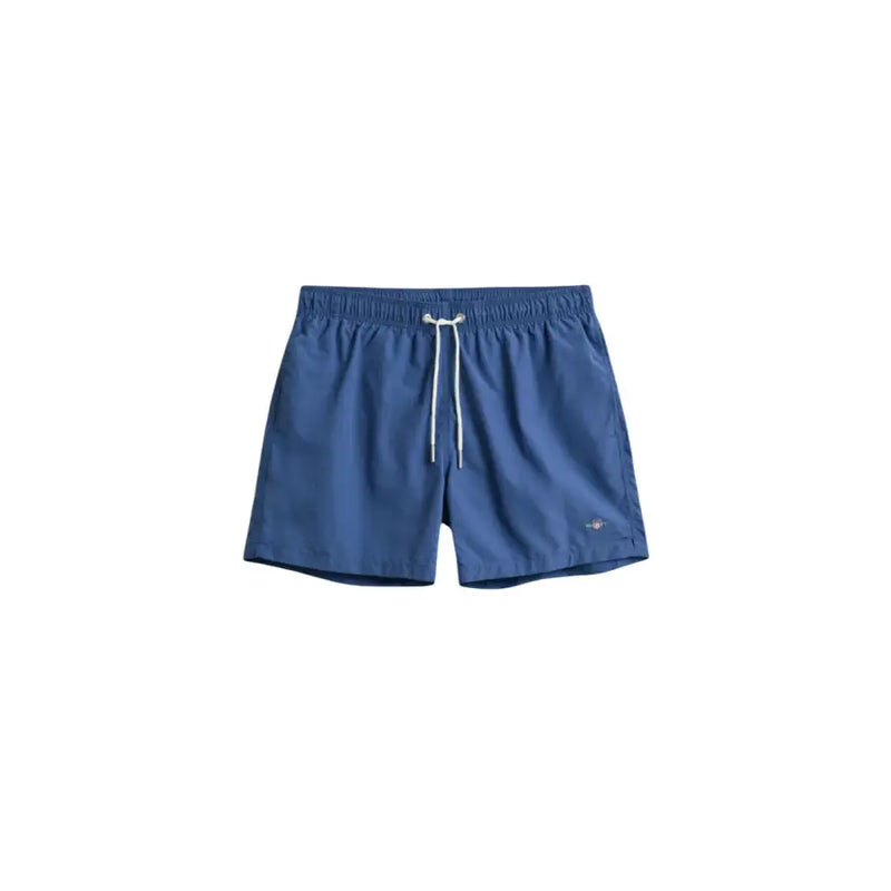 Gant men swimwear blue swim trunks with white drawstrings and small logo on lower right leg for beachwear
