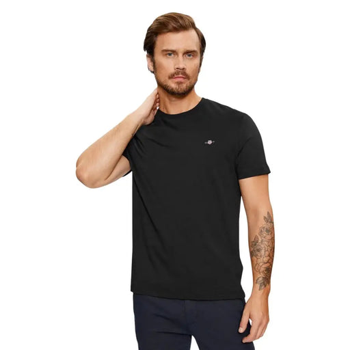 Black gant men short sleeve crew neck cotton t shirt with a small white logo on the left chest for casual wear