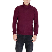 Burgundy turtleneck sweater with a subtle pattern and ribbed cuffs, collar, and hem.
